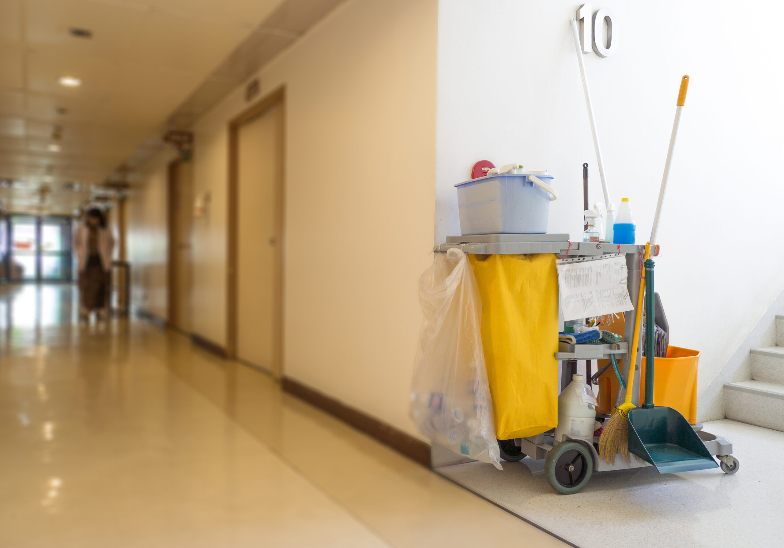 Cleaning tools cart wait for maid or cleaner in the hospital. Bucket and set of cleaning equipment in the hospital. Concept of service, worker and equipment for cleaner and health