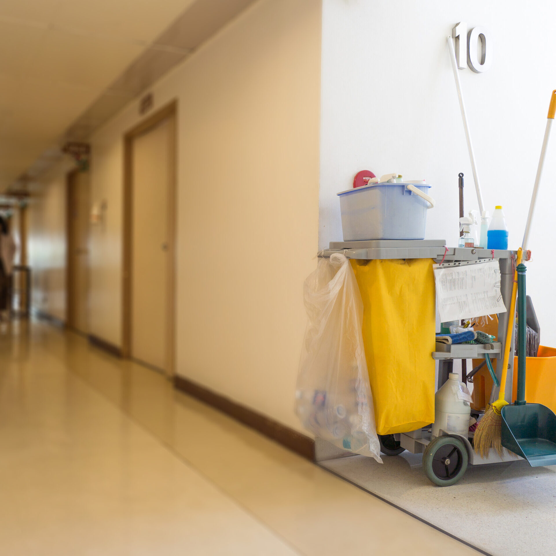 Cleaning tools cart wait for maid or cleaner in the hospital. Bucket and set of cleaning equipment in the hospital. Concept of service, worker and equipment for cleaner and health